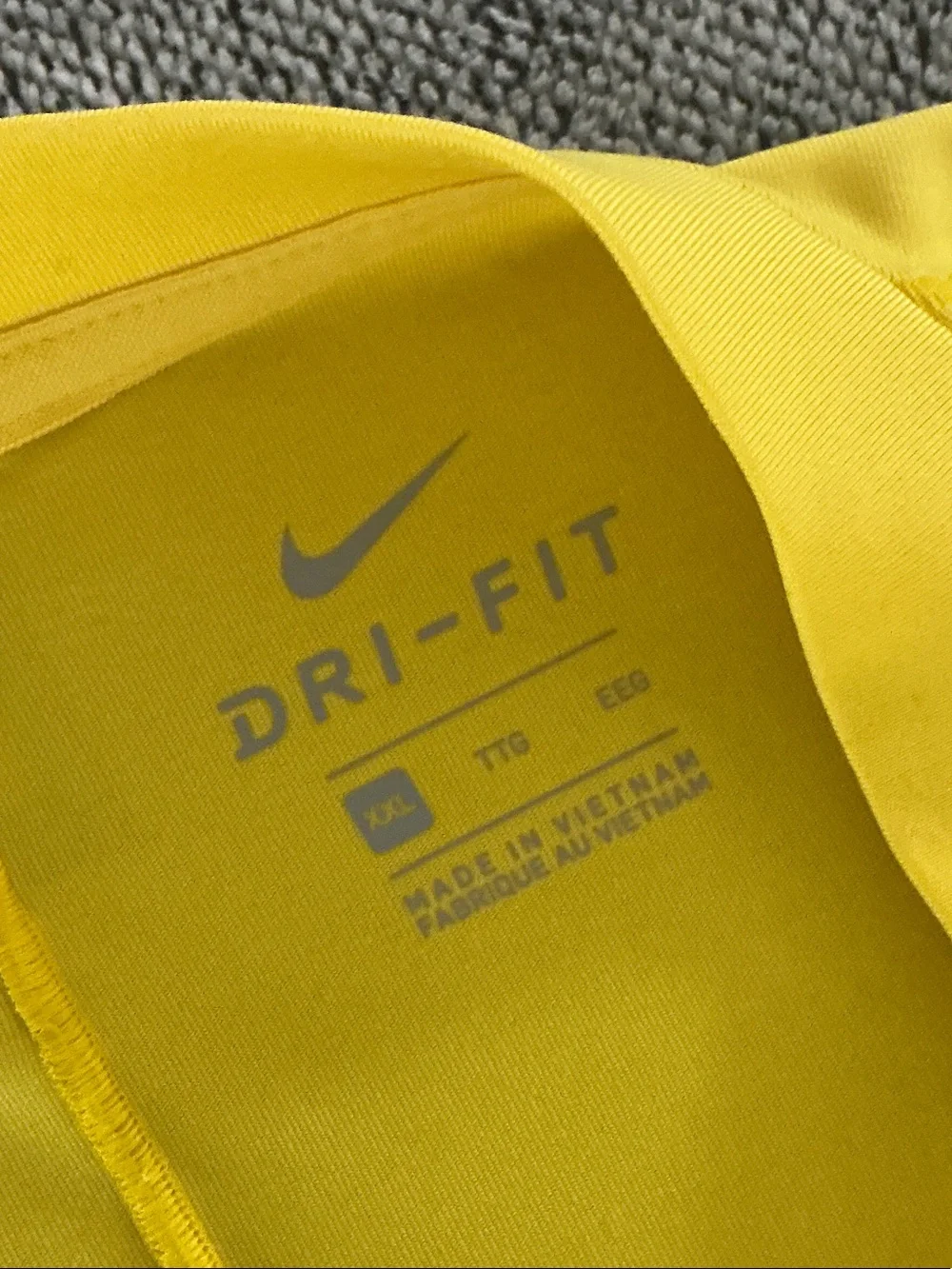 Nike Yellow Short-Sleeve Athletic Jersey with Chevron Accent